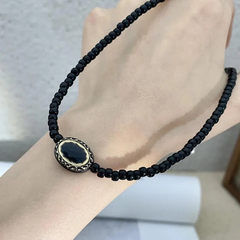 Collana vintage barocca con perline nere e oro, regalo di Natale o compleanno.