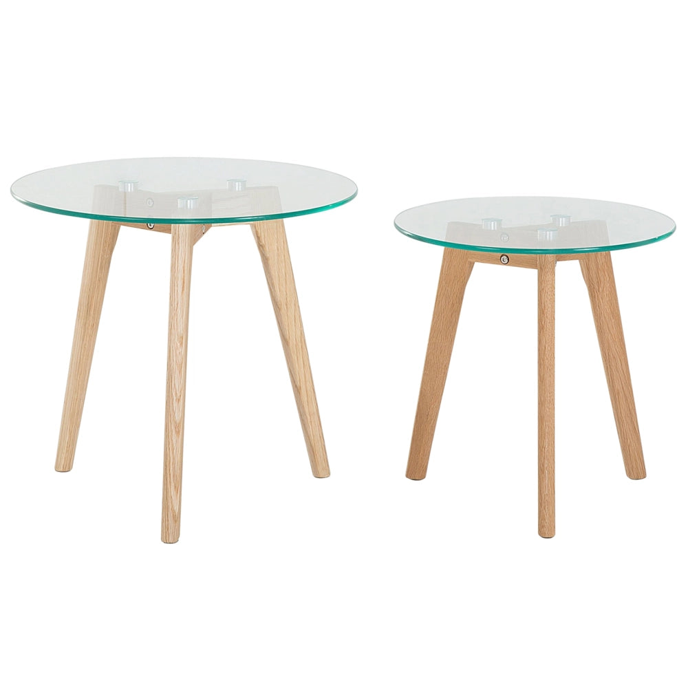 Set di 2 tavolini a nido tondi trasparenti con piano in vetro 3 gambe in legno chiaro minimalista scandinavo