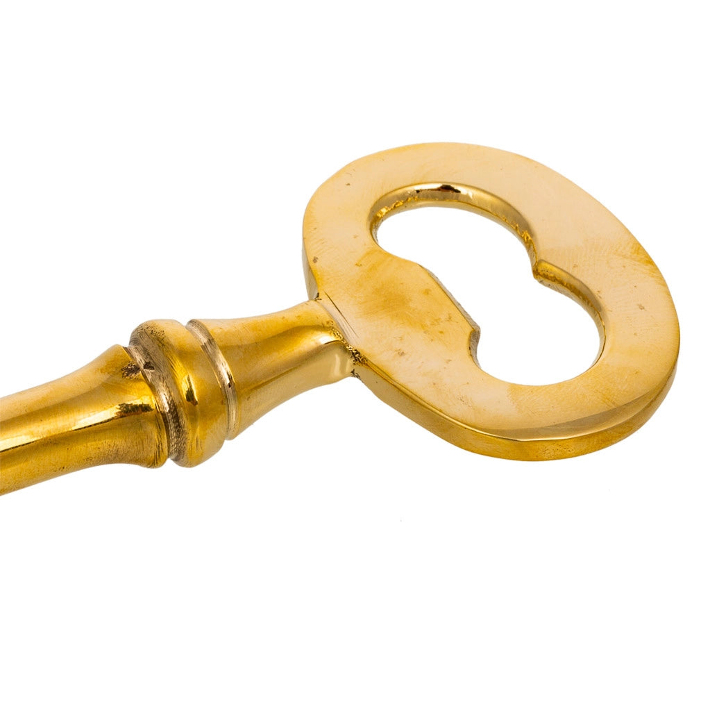 Aprichiave in metallo dorato 4x2x15,5h