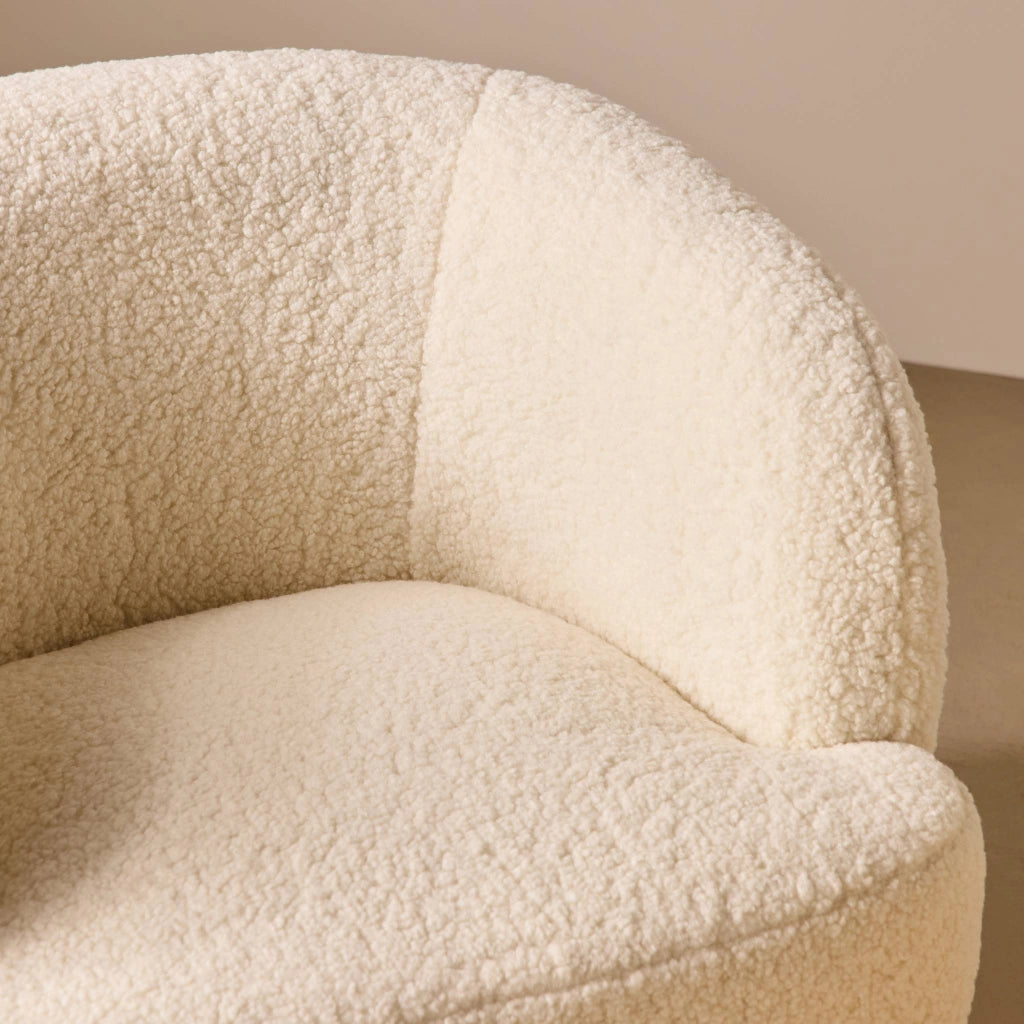 Poltrona girevole 360º in metallo e bouclé, crema