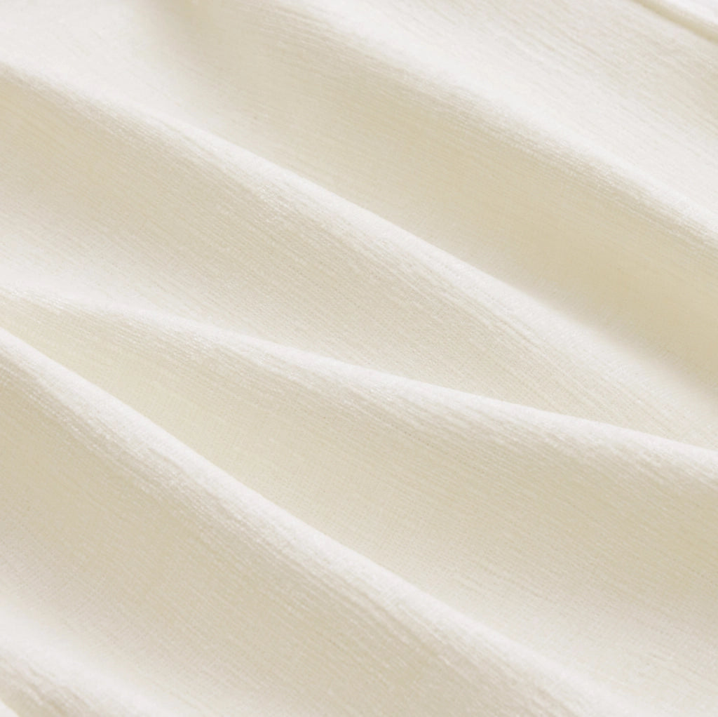 Divano modulare angolare in chenille beige con 2 pouf; braccioli regolabili e 6 cuscini; 284x156;5x86 cm
