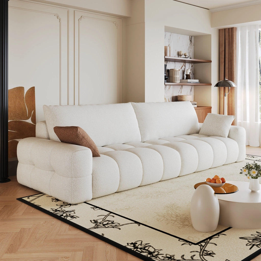 Divano modulare con chaise longue reversibile; seduta profonda e senza montaggio in tessuto bianco crema; 260 cm