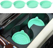 Set di 4 sostituenti di pedana in silicone antiscivolo per auto, che impediscono lo scricchiolio e offrono una comoda opzione di trasporto per bottiglie d'acqua. Dimensioni: 8*8*3 cm, colore verde.
