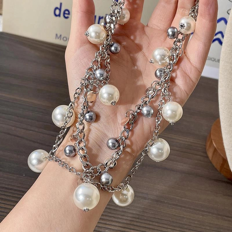 Collana girocollo fatta a mano con pendente di perle dai colori contrastanti e perline, ideale come regalo di Natale o di compleanno.