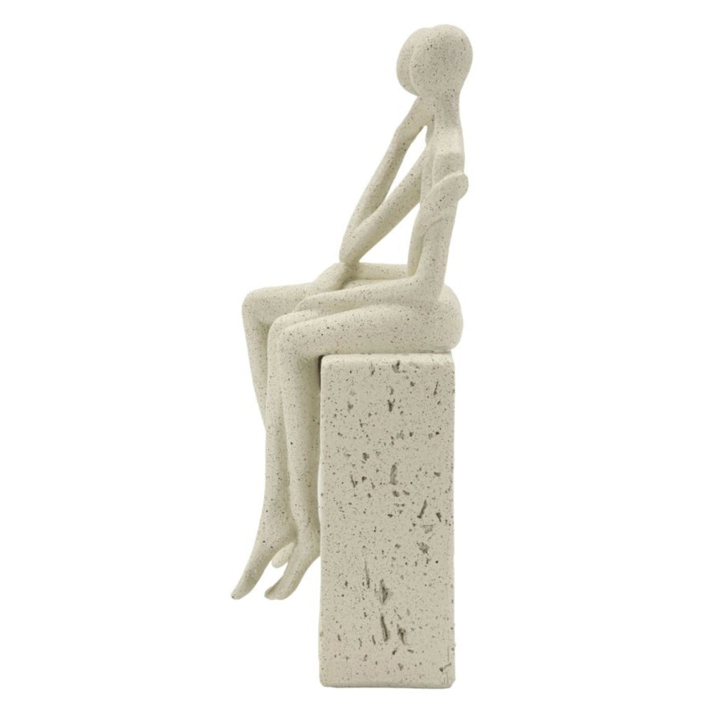 Statuetta coppia Stons in resina color crema