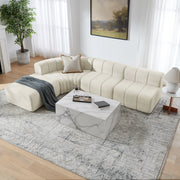 Divano angolare modulare a 4 posti in chenille beige; componibile e multifunzione