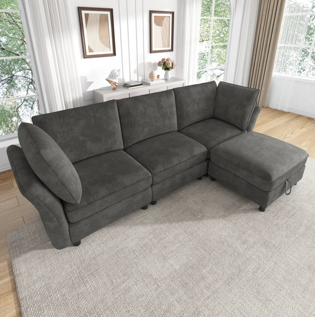 Divano modulare a L 225x137x84 cm in chenille grigio con pouf contenitore e cuscini