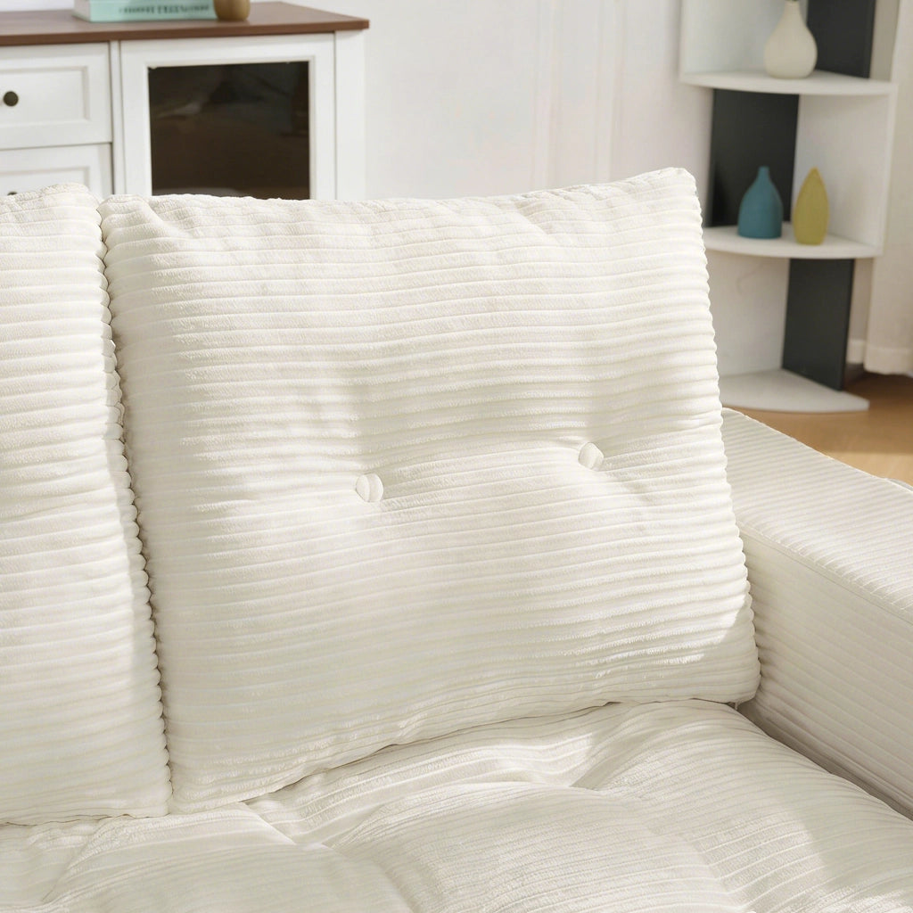 Divano letto a due posti in velluto a coste beige con tasche laterali e portabicchiere