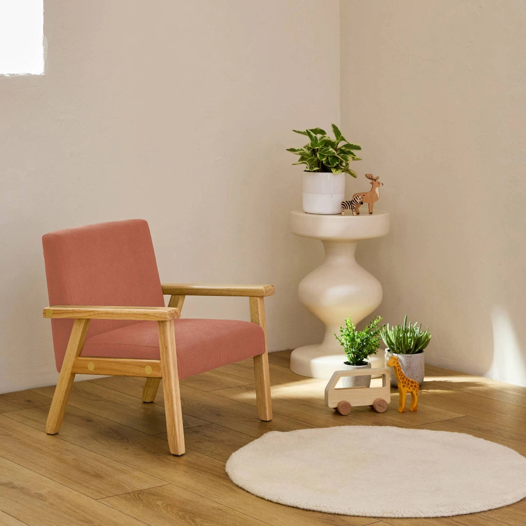 Poltrona scandinava per bambini in velluto a coste e legno di gomma,
