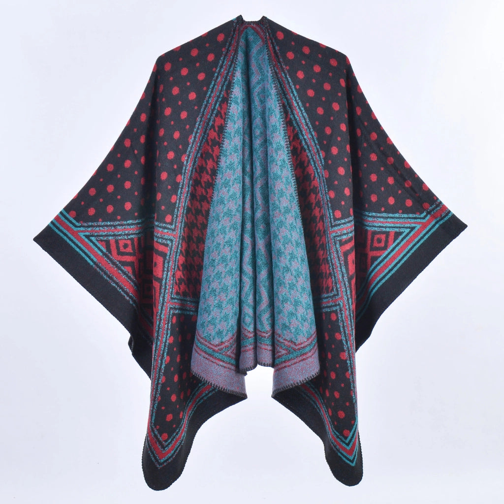Mantella da donna spessa e calda con spacco, fantasia pied de poule e pois, a blocchi di colore.
