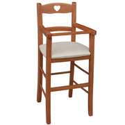 Seggiolone in legno color ciliegio con seduta imbottita in similpelle beige