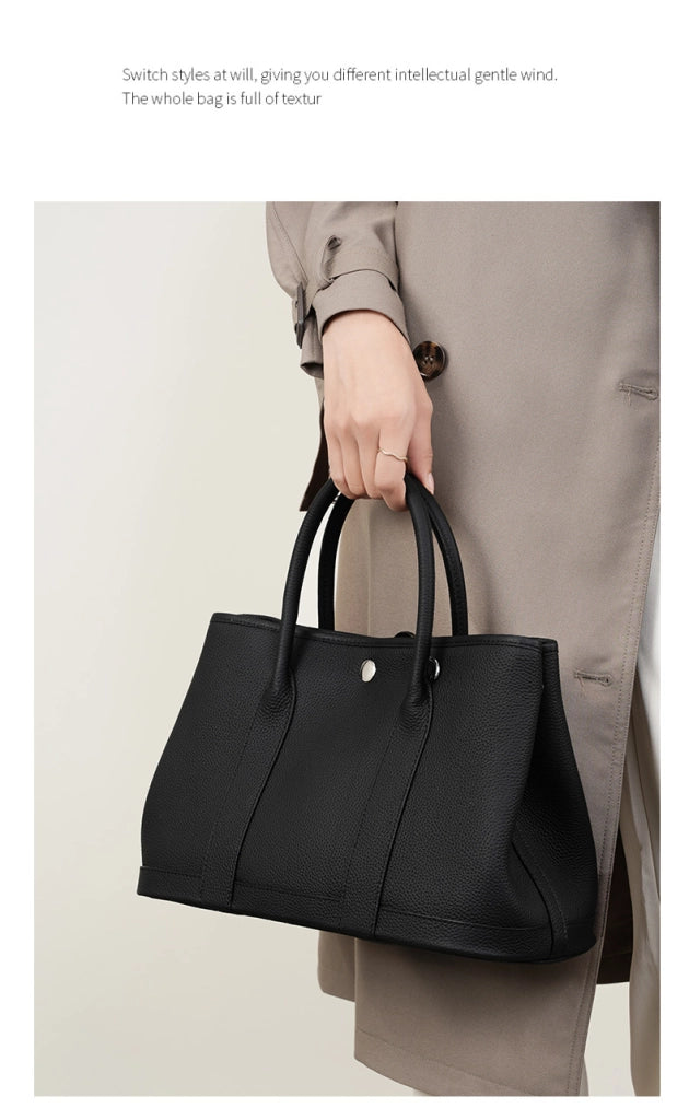 Borsa a mano e borsetta da donna in vera pelle, nera.