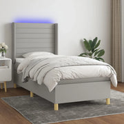 Letto a Molle Materasso e LED Grigio Chiaro 90x190 cm Tessuto