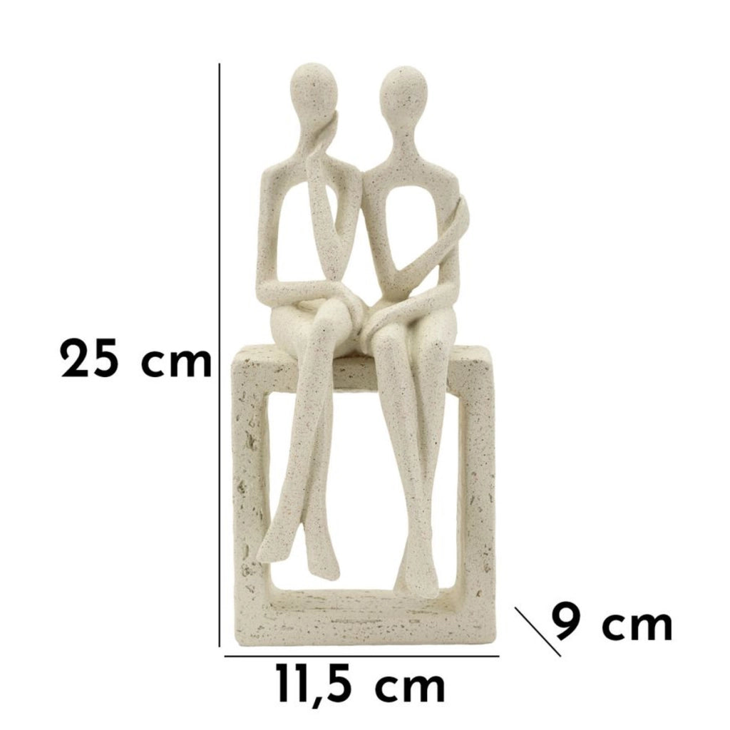 Statuetta coppia Stons in resina color crema