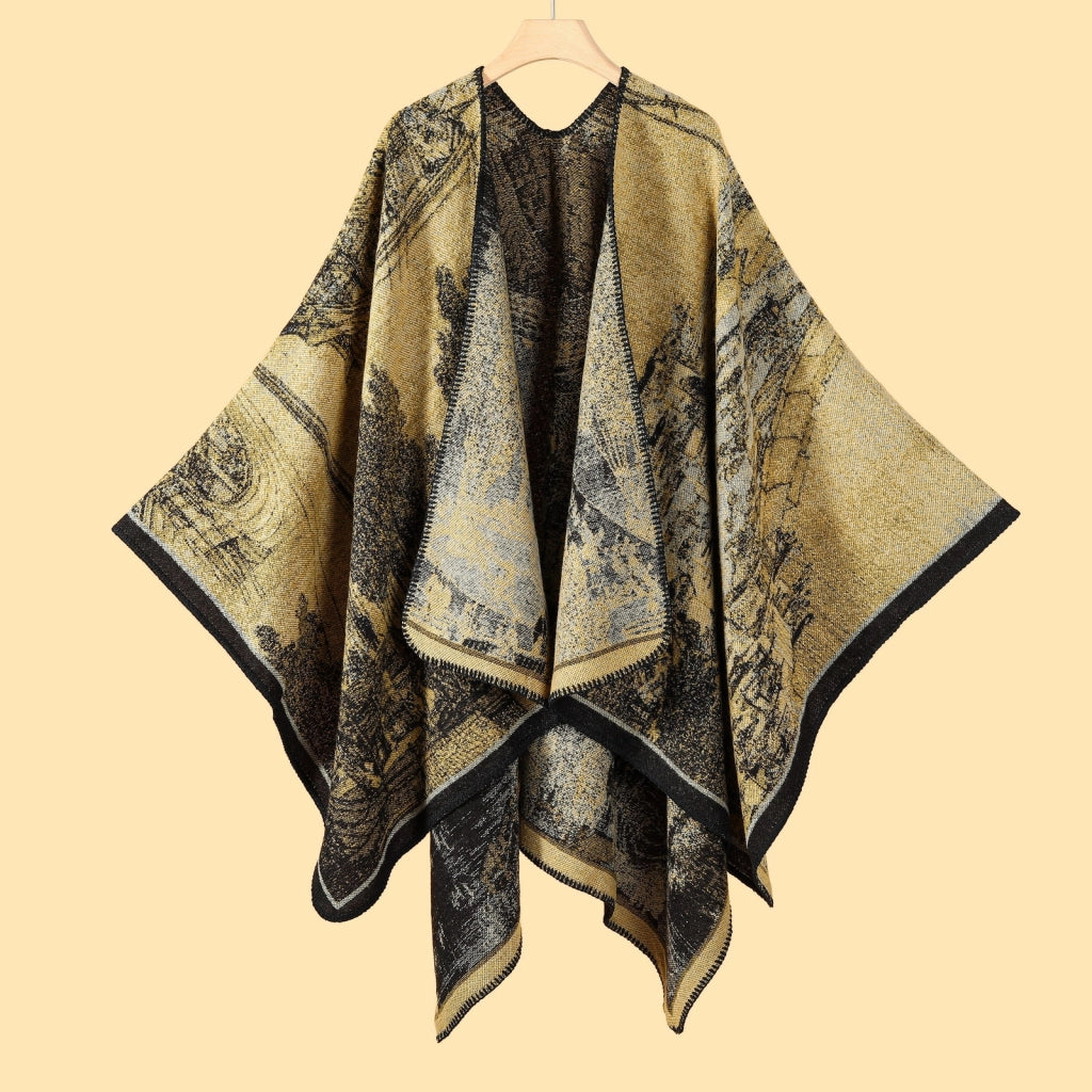 Design ispirato alla foresta con mantello e scialle con spacco.