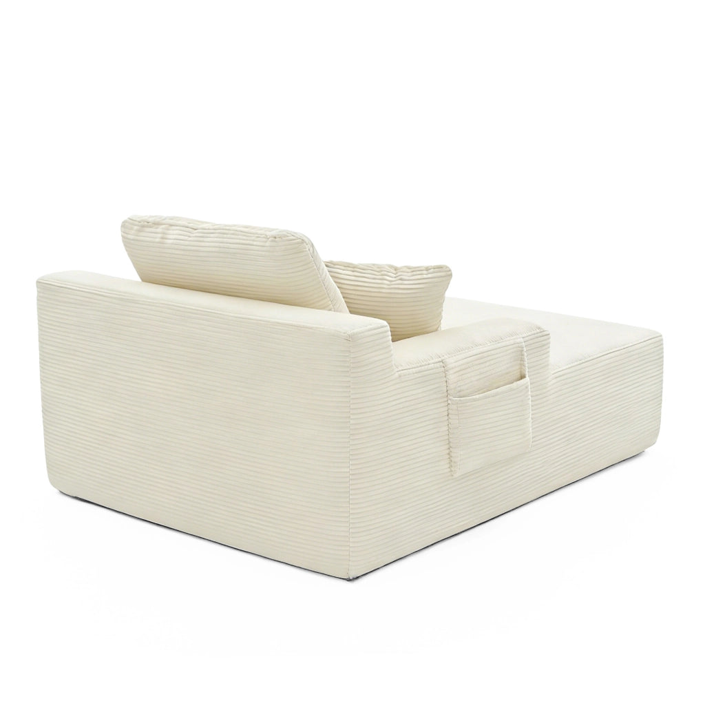 Sofa compatto in corduroy beige con tasche laterali e cuscini inclusi