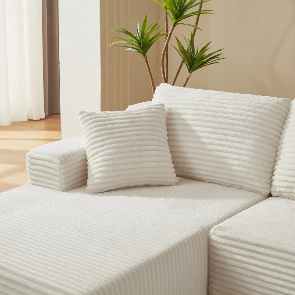 Divano modulare a L con sedute ampie e cuscini sfoderabili in schiuma e molle per salotto bianco 252.5 × 163.0 × 65.0 cm