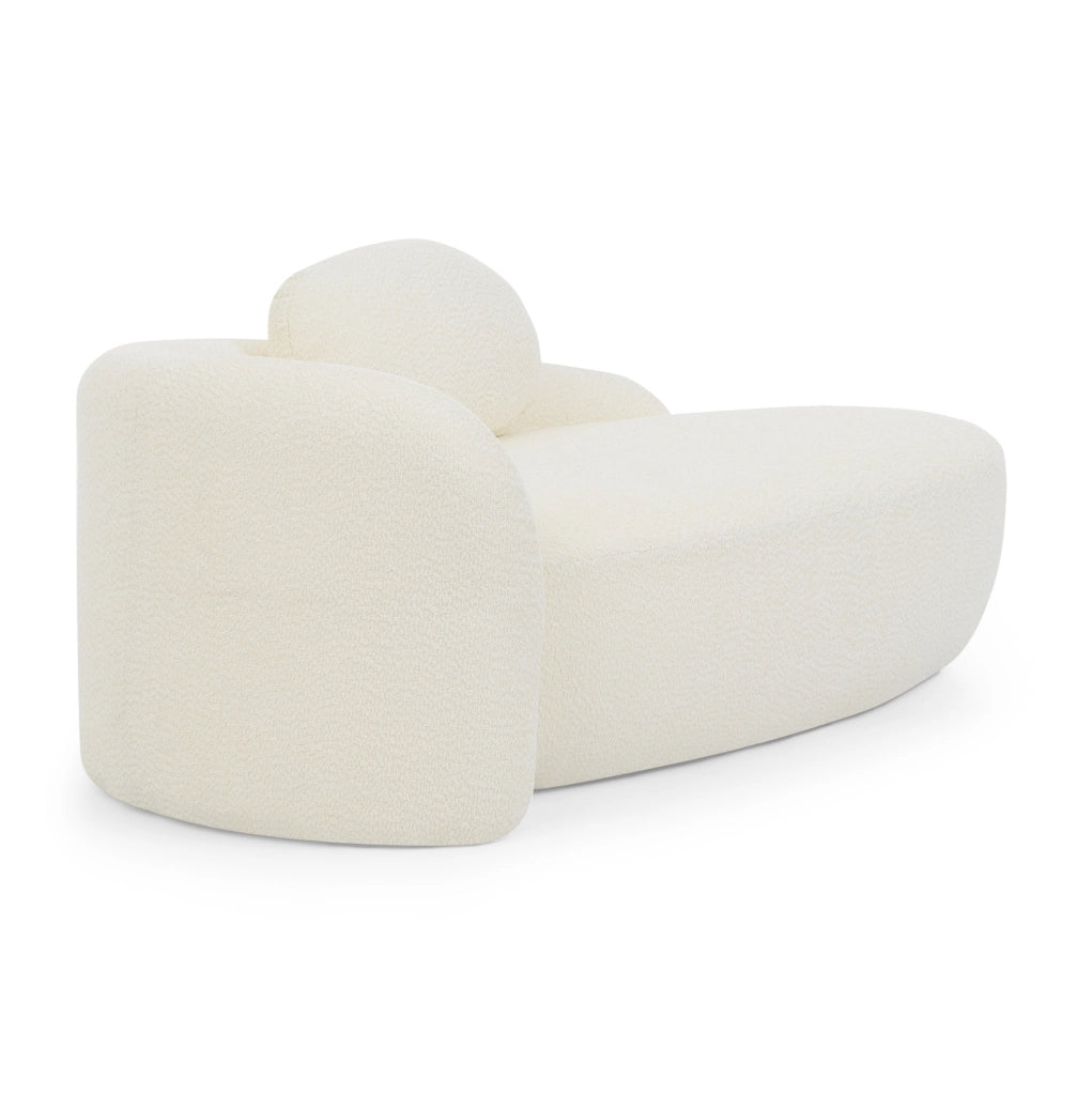 Sofa in tessuto teddy con design arrotondato; beige