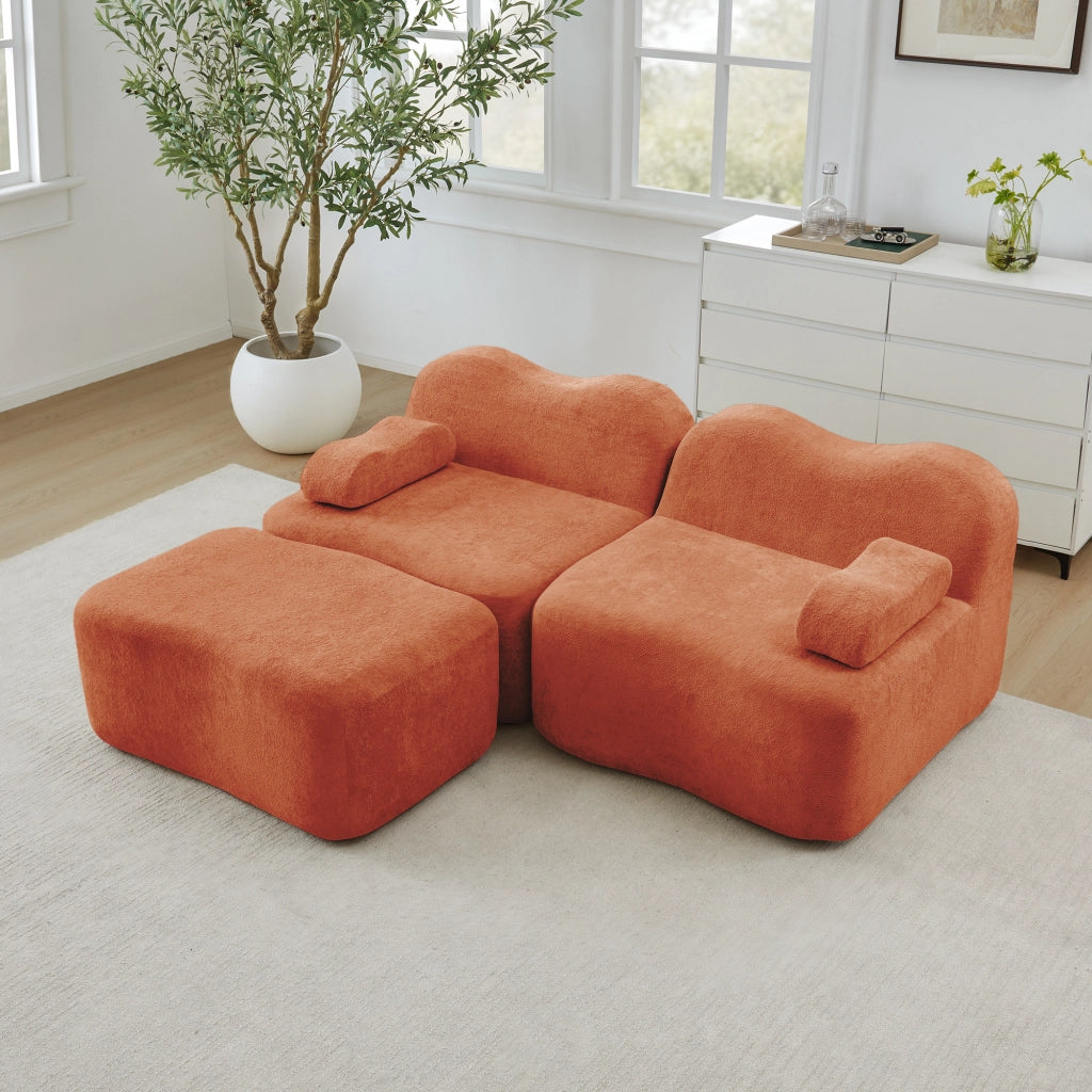Divano angolare modulare 2 posti con pouf; forma ondulata e cuscino bracciolo mobile in velluto arancione