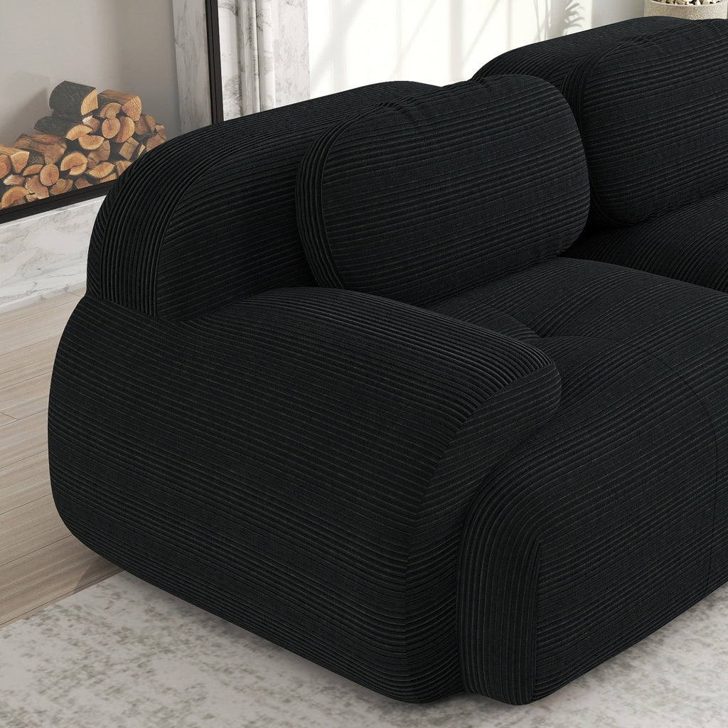 Divano angolare modulare in velluto a coste senza montaggio con braccioli ergonomici e base antiscivolo nero