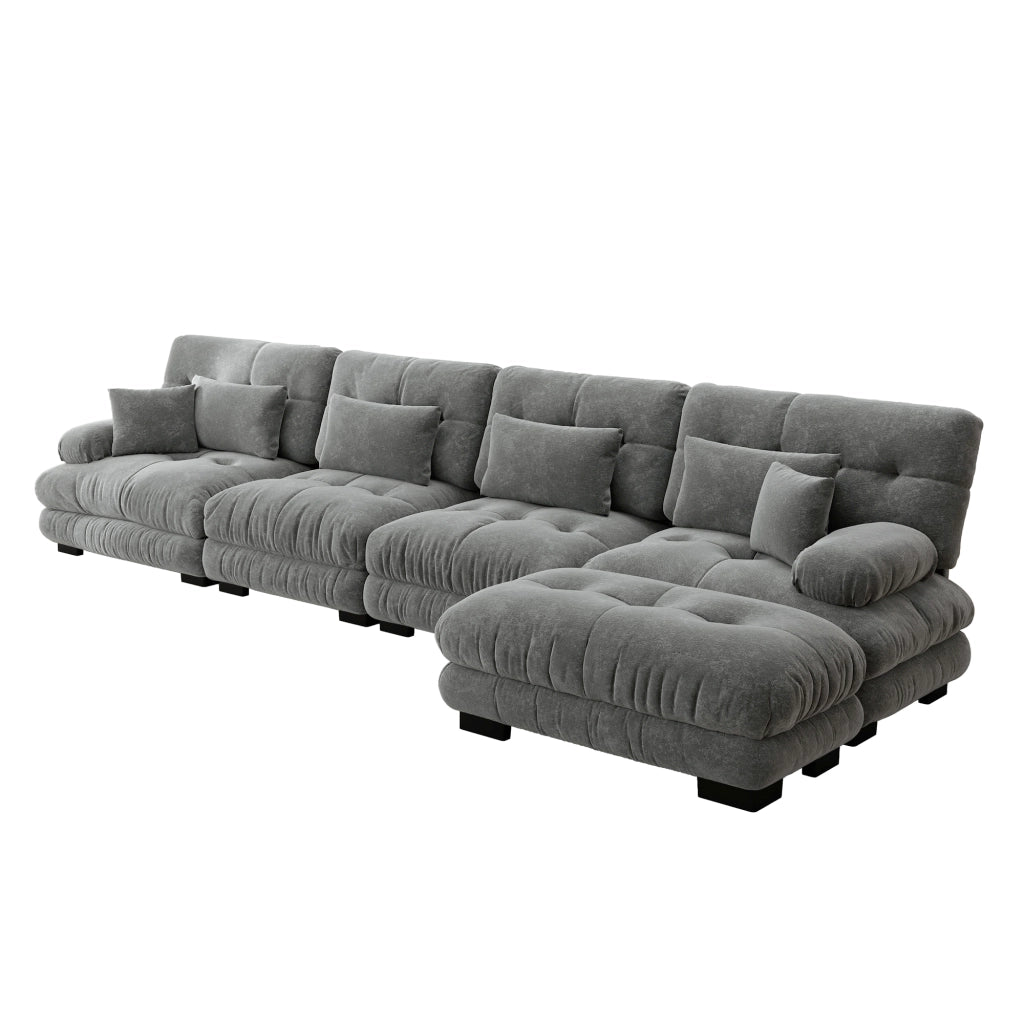 Divano angolare modulare 4 posti con ottomani mobili e cuscini decorativi effetto cloud in chenille grigio
