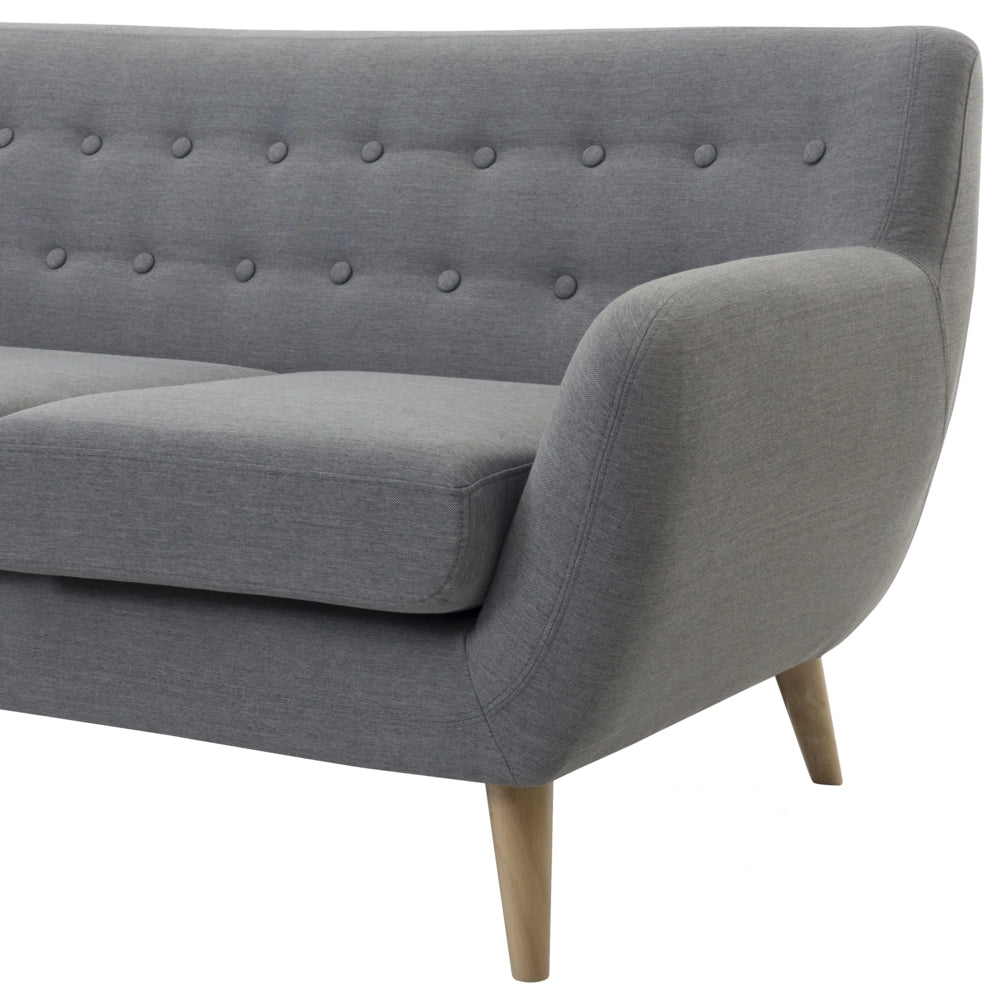 Divano a 3 posti grigio chiaro imbottito con schienale capitonnè gambe in legno chiaro spesso imbottito soggiorno minimalista scandinavo