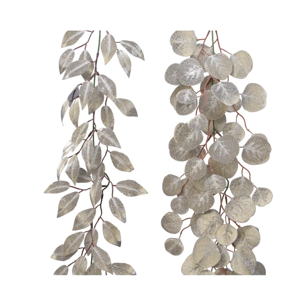 Ramo foglie imbiancate 150 cm  Realizzate in PVC e PE, lunghezza 150 centimetri, 2 fantasie disponibili.