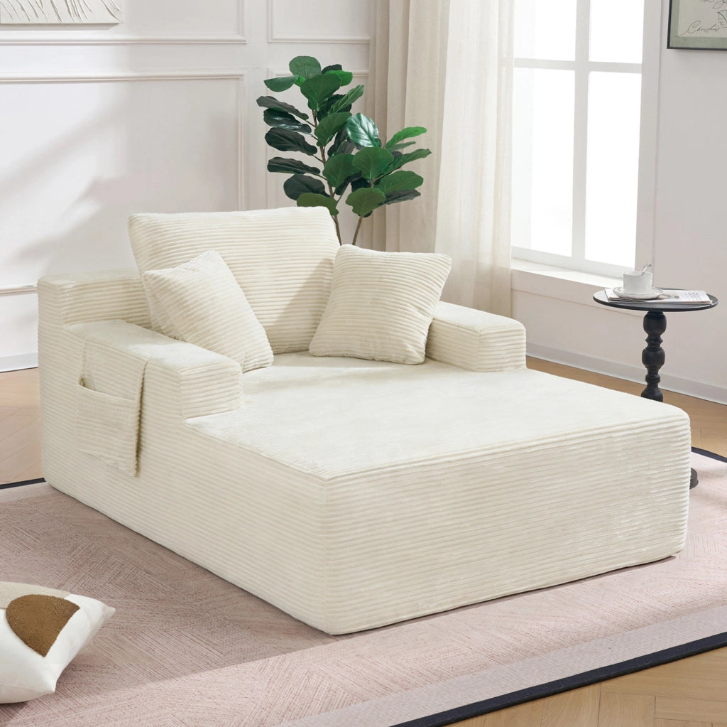 Sofa compatto in corduroy beige con tasche laterali e cuscini inclusi