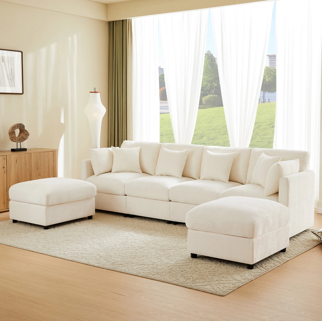 Divano modulare angolare in chenille beige con 2 pouf; braccioli regolabili e 6 cuscini; 284x156;5x86 cm