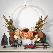 Decorazione d'ingresso e parete per l'autunno con fiori artificiali